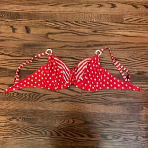 Underwire bikini top red and white with adjustable straps. Size USA 34d.